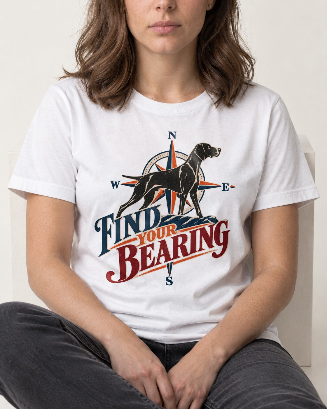 Find Your Bearing German Shorthaired Pointer T-Shirt in White, worn by a seated model