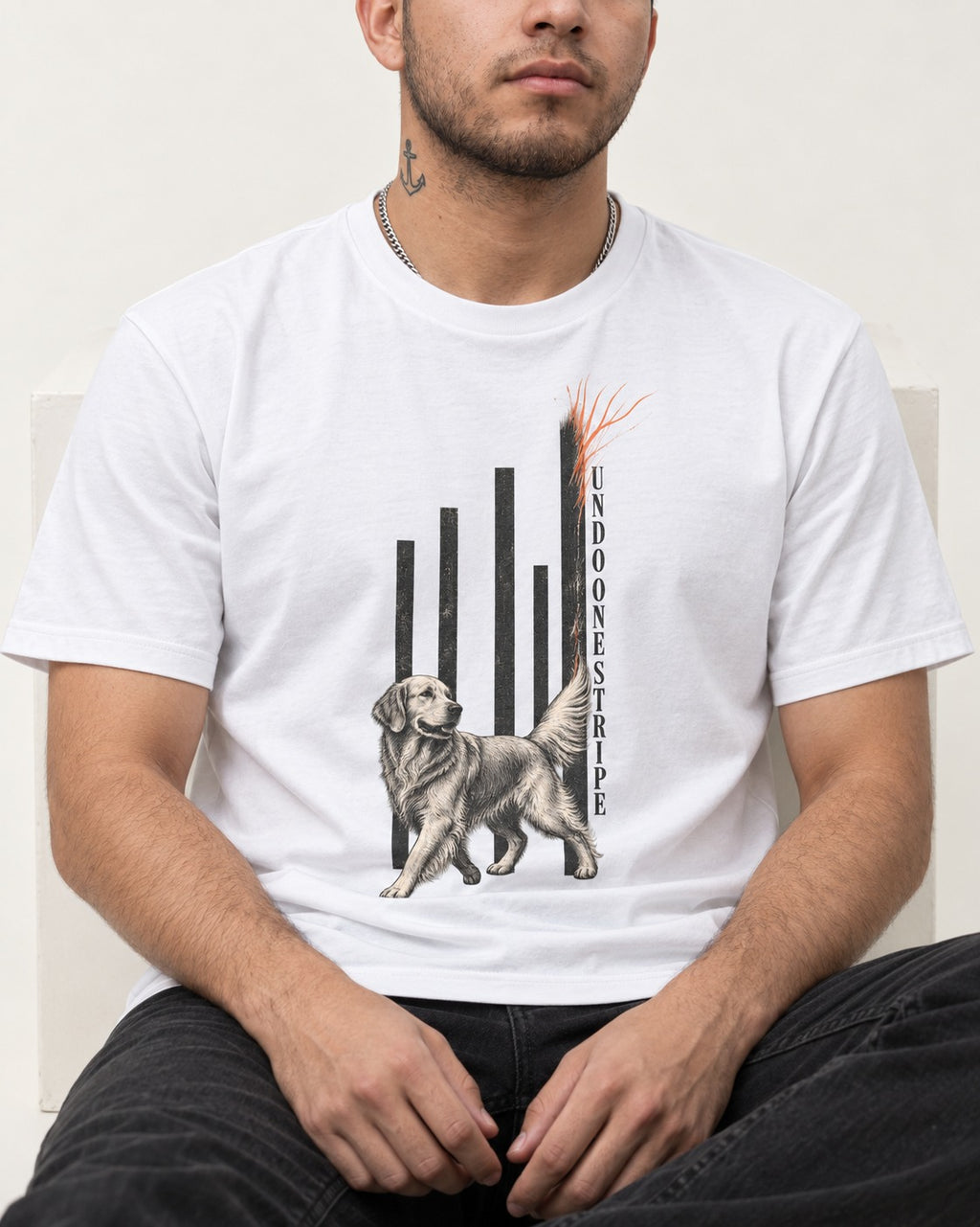 Undo One Stripe Golden Retriever T-Shirt in White, worn by a seated model