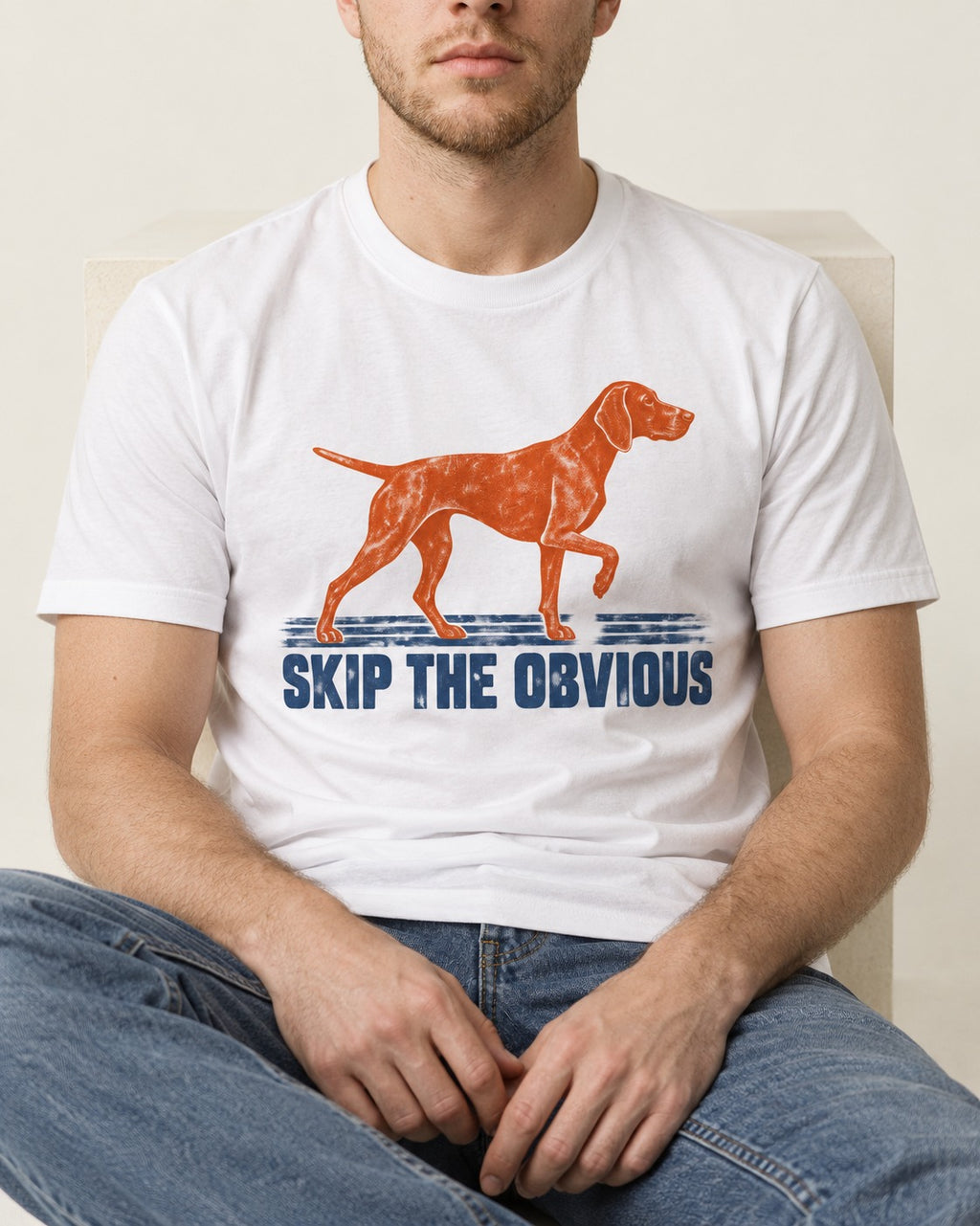 Skip the Obvious German Shorthaired Pointer T-Shirt in White, worn by a seated model