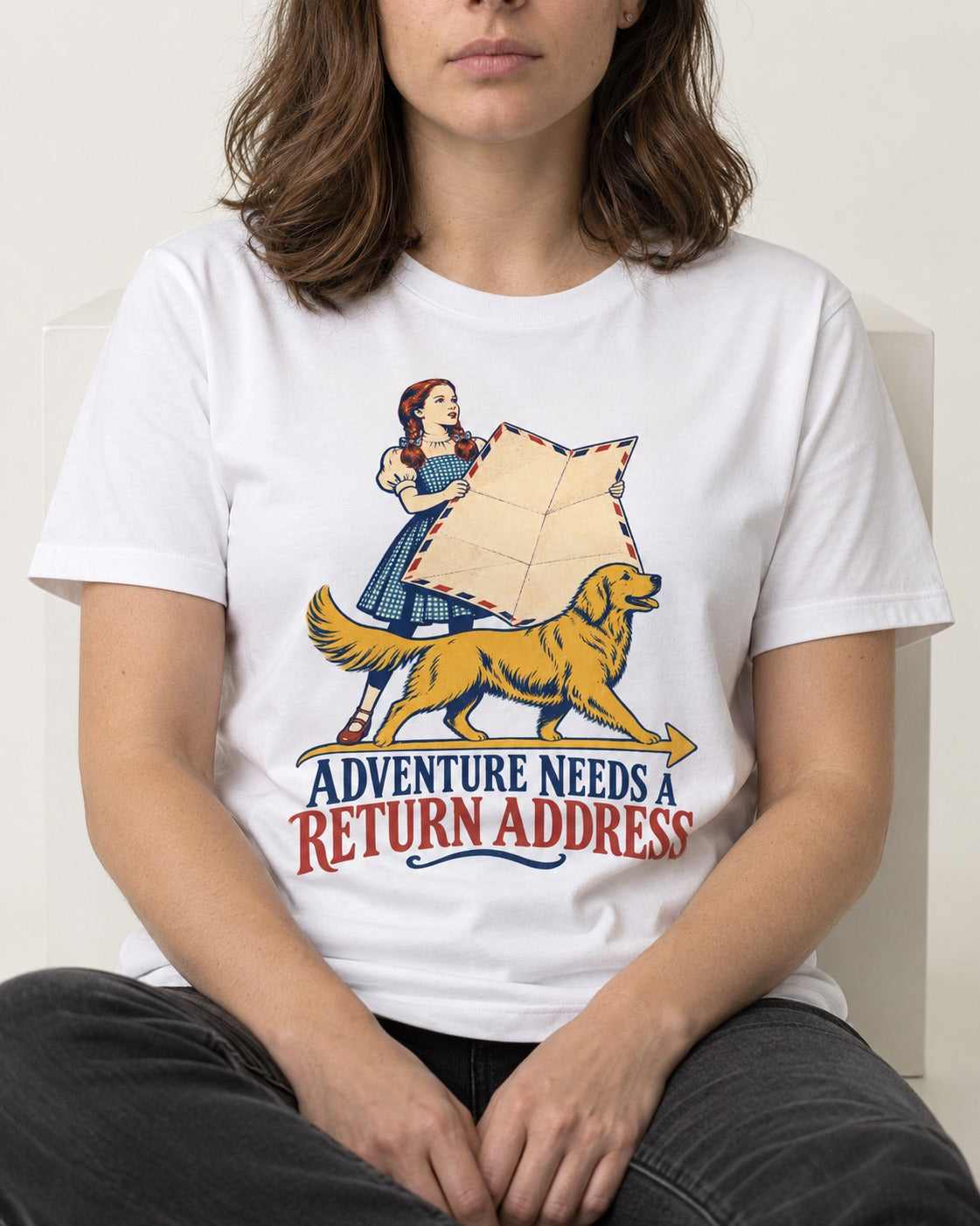 Golden Retriever Return Address T-Shirt in White, worn by a seated model