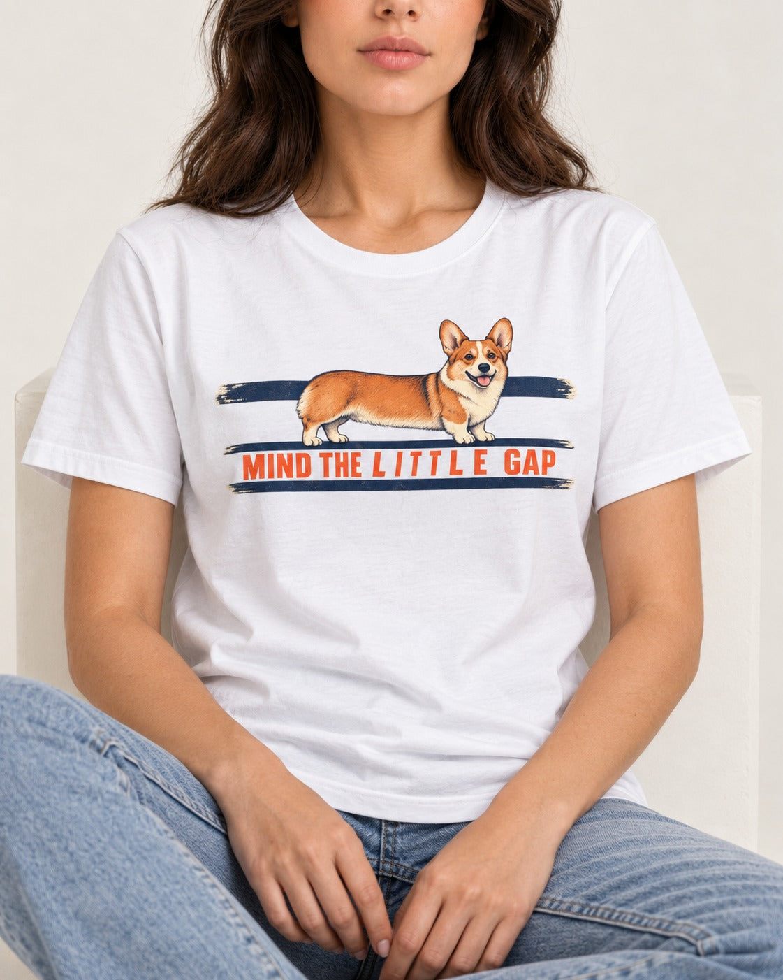 Mind the Little Corgi Gap T-Shirt in White, worn by a seated model