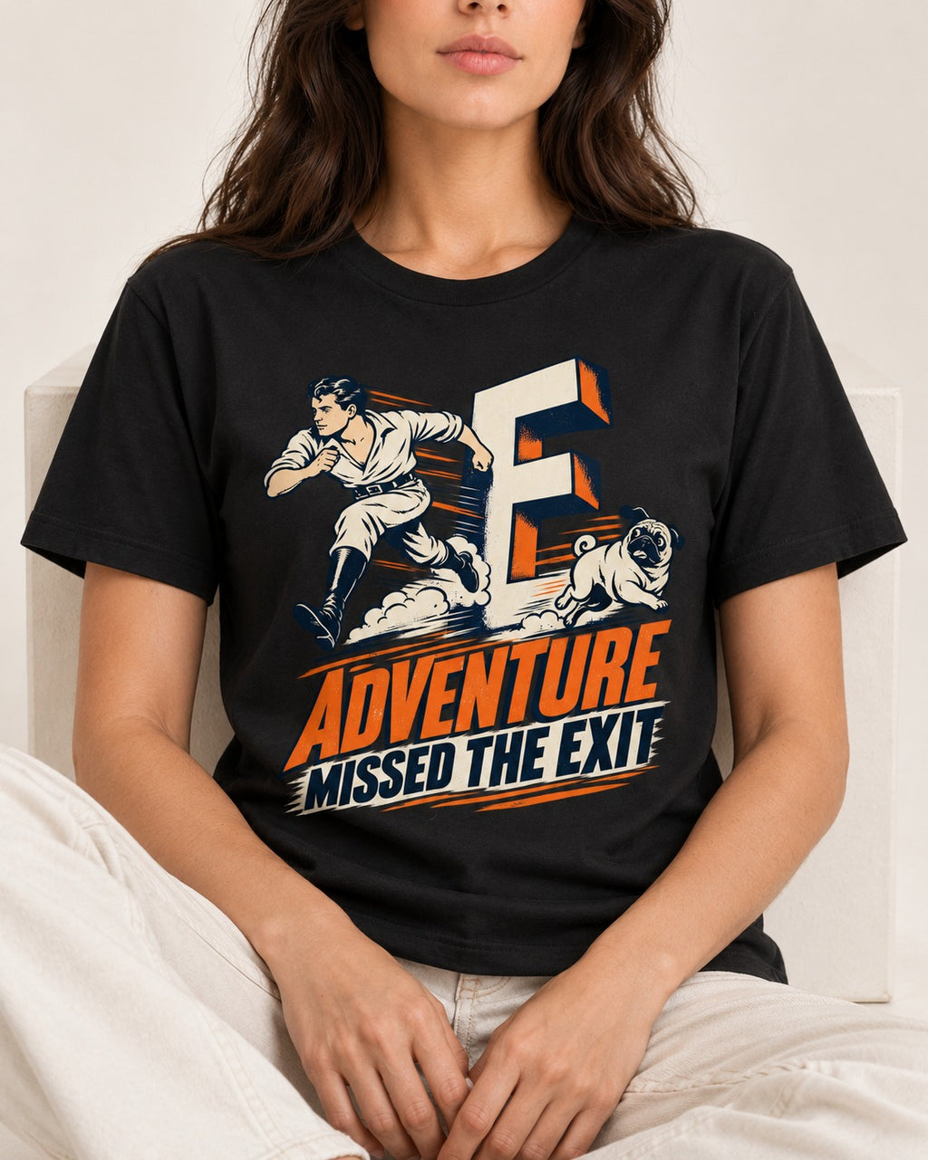 Pug Adventure Missed the Exit Running Graphic T-Shirt in Black, worn by a seated model