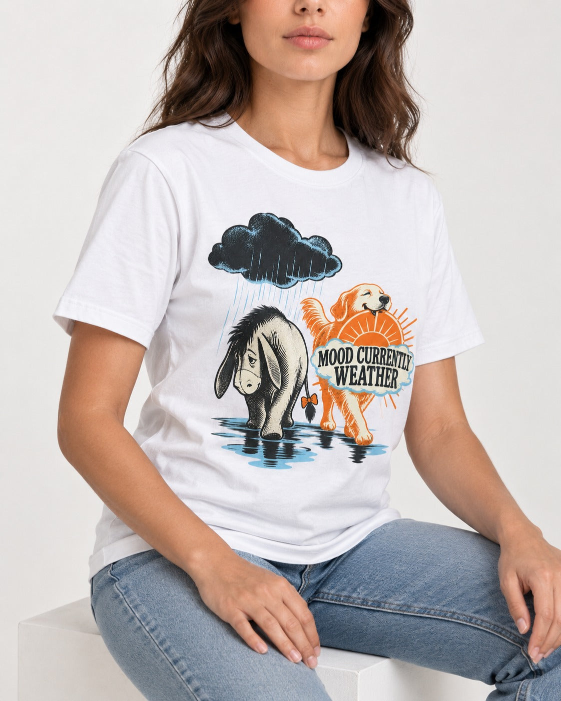 Mood Currently Golden Retriever Weather T-Shirt in White, worn by a seated model