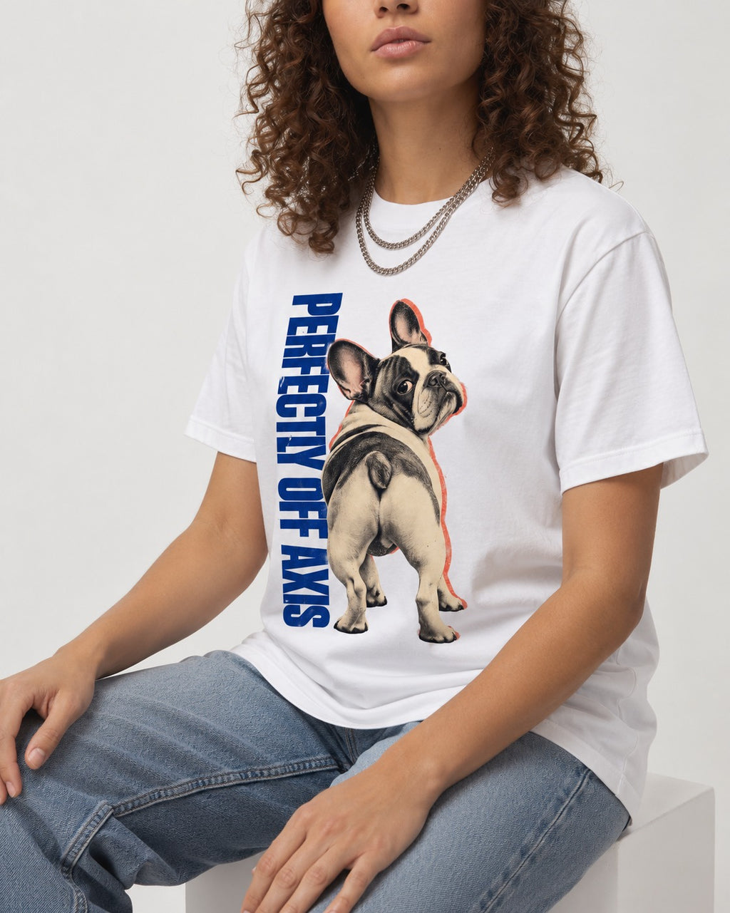 Perfectly Off Axis Frenchie T-Shirt in White, worn by a seated model