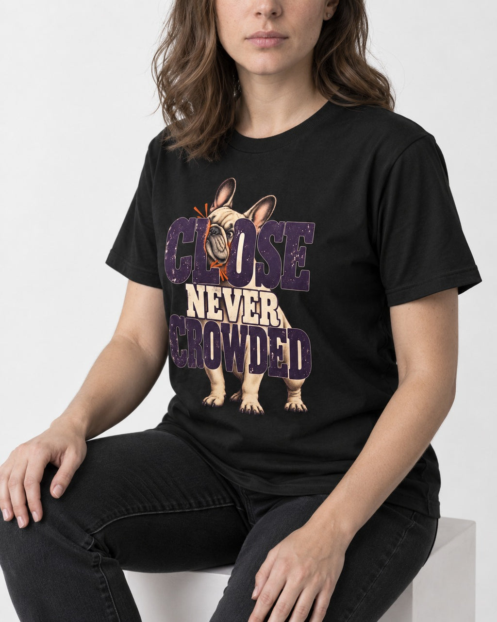 Frenchie Close Never Crowded Peekaboo Type Graphic T-Shirt in Black, worn by a seated model