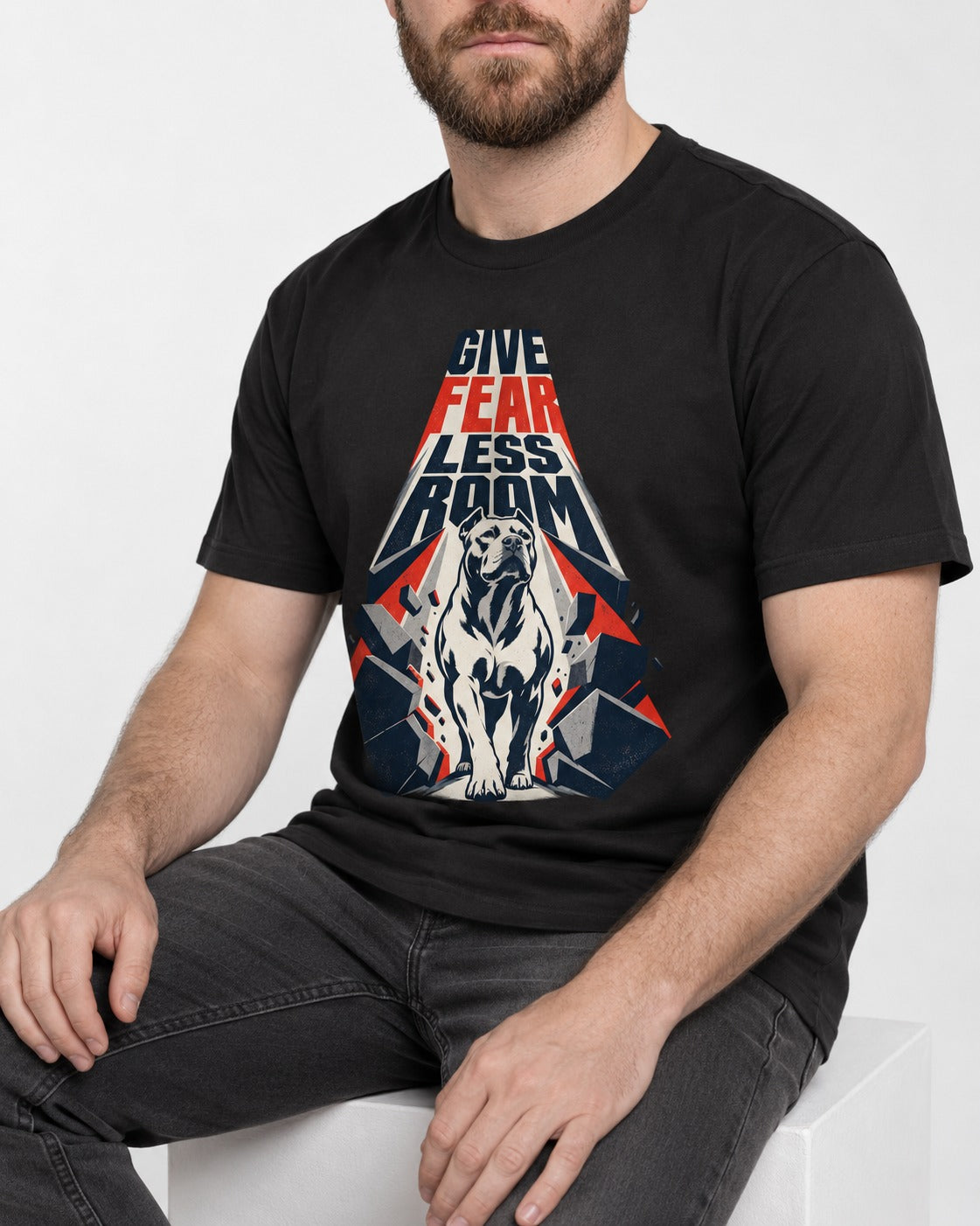Pitbull Give Fear Less Room Breakthrough Graphic T-Shirt in Black, worn by a seated model