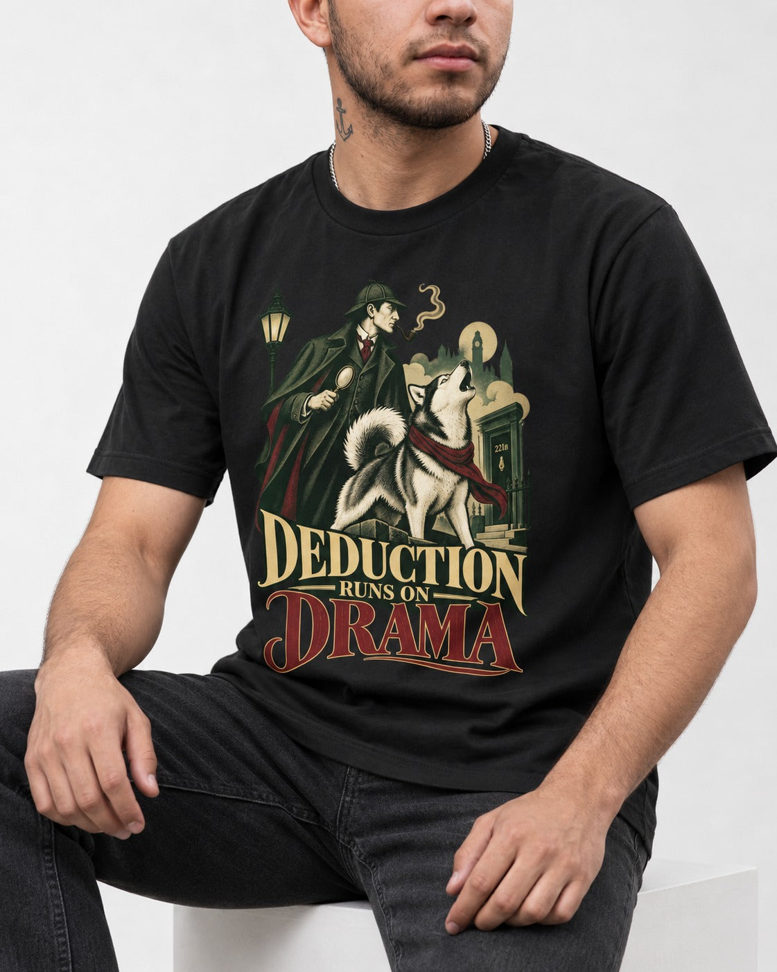Husky Deduction Runs on Drama Detective Graphic T-Shirt in Black, worn by a seated model
