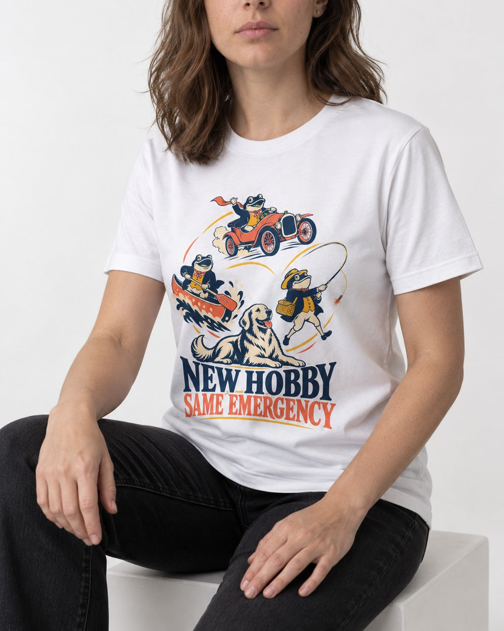 Golden Retriever New Hobby Same Emergency T-Shirt in White, worn by a seated model
