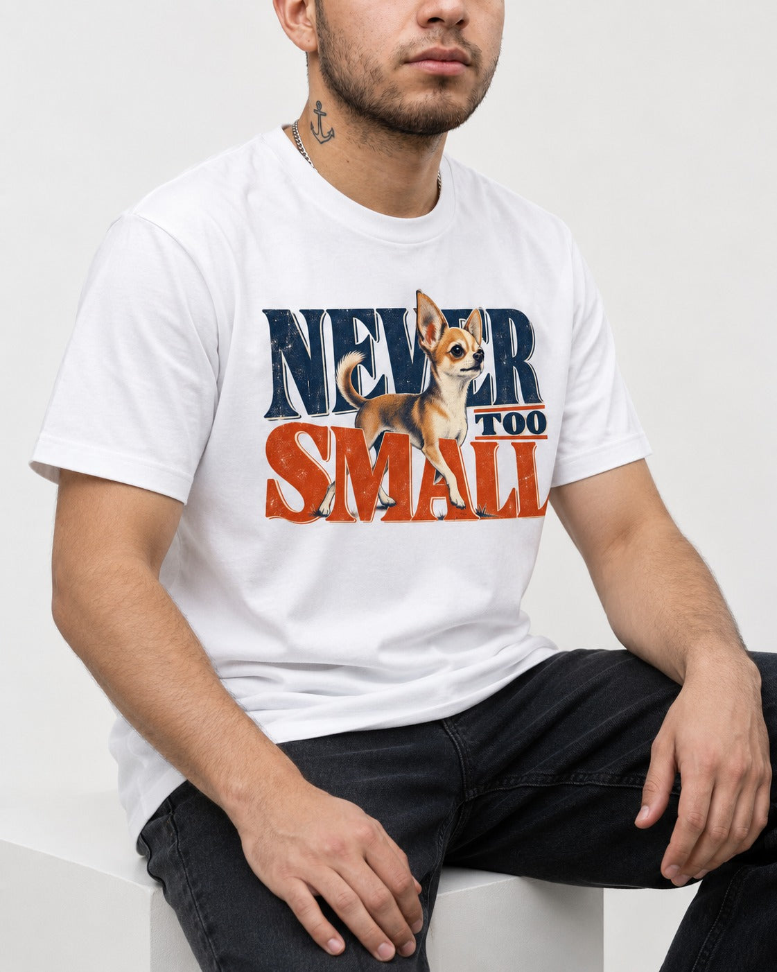 Chihuahua Never Too Small T-Shirt in White, worn by a seated model