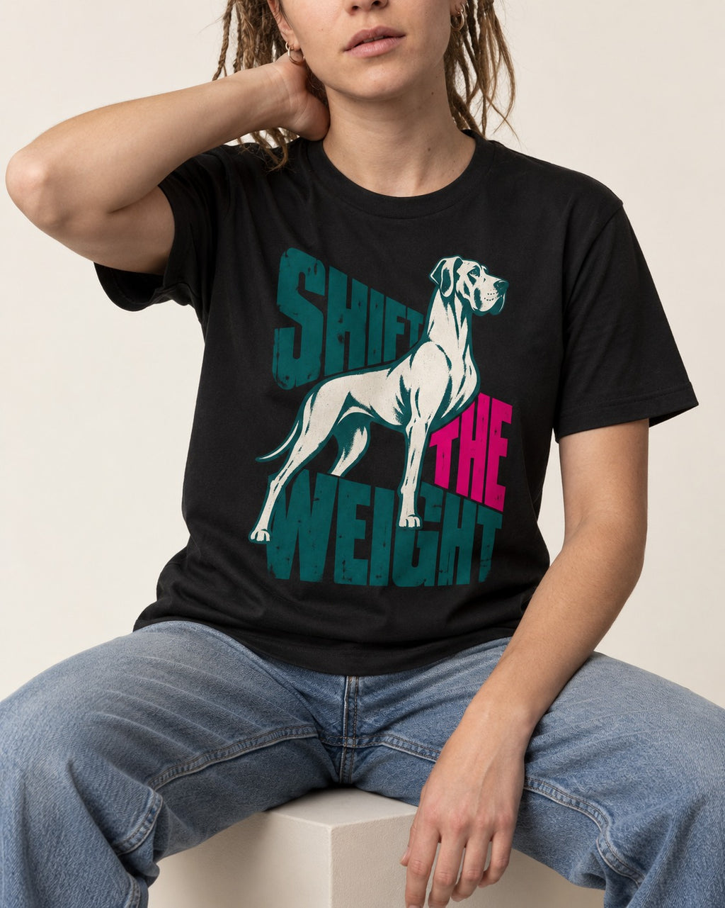 Great Dane Shift the Weight Standing Graphic T-Shirt in Black, worn by a seated model