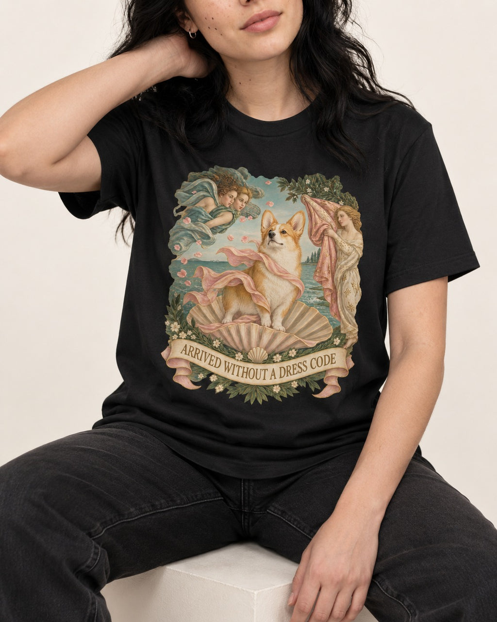 Corgi Arrived Without a Dress Code Birth of Venus T-Shirt in Black, worn by a seated model