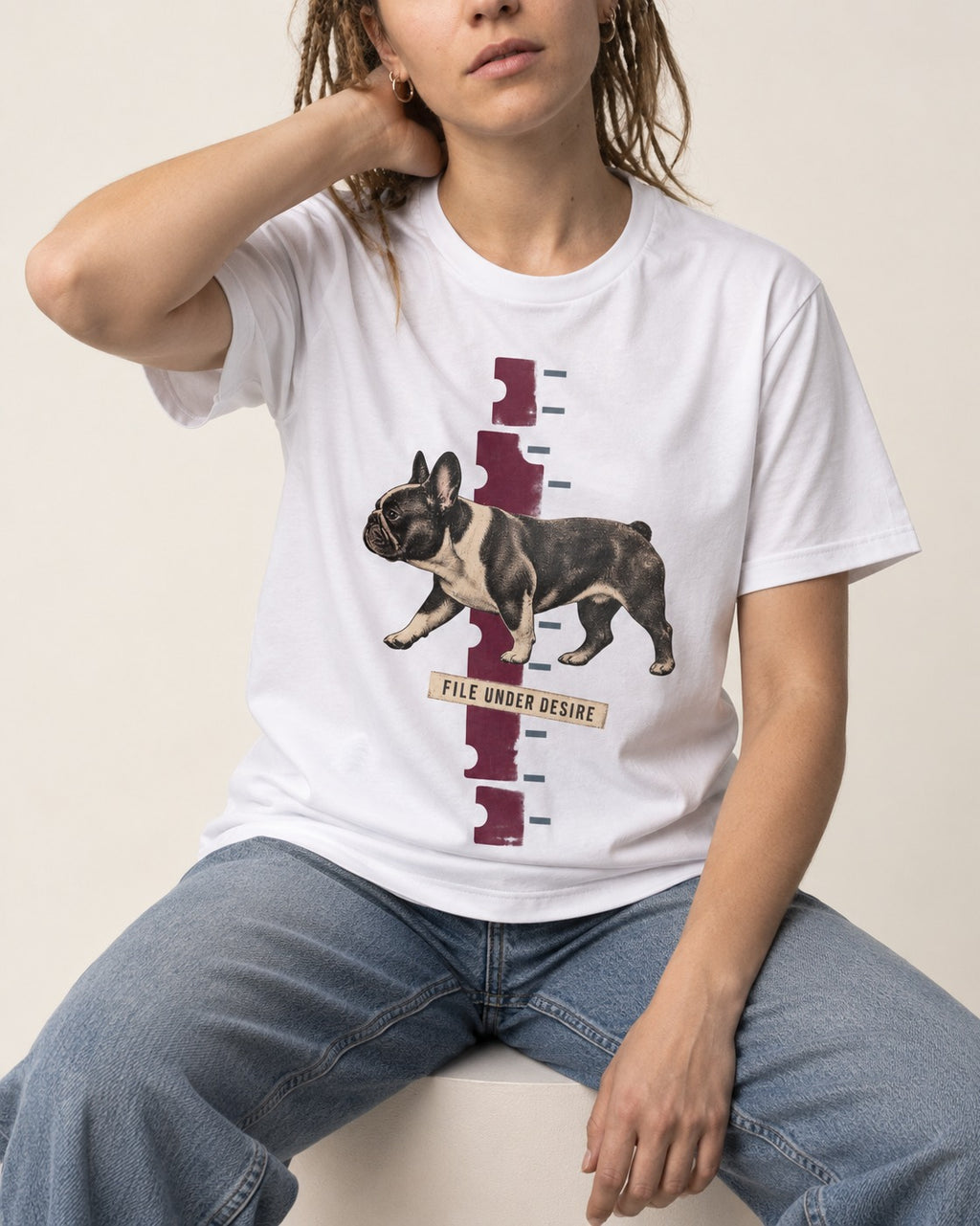 File Under Frenchie Desire T-Shirt in White, worn by a seated model
