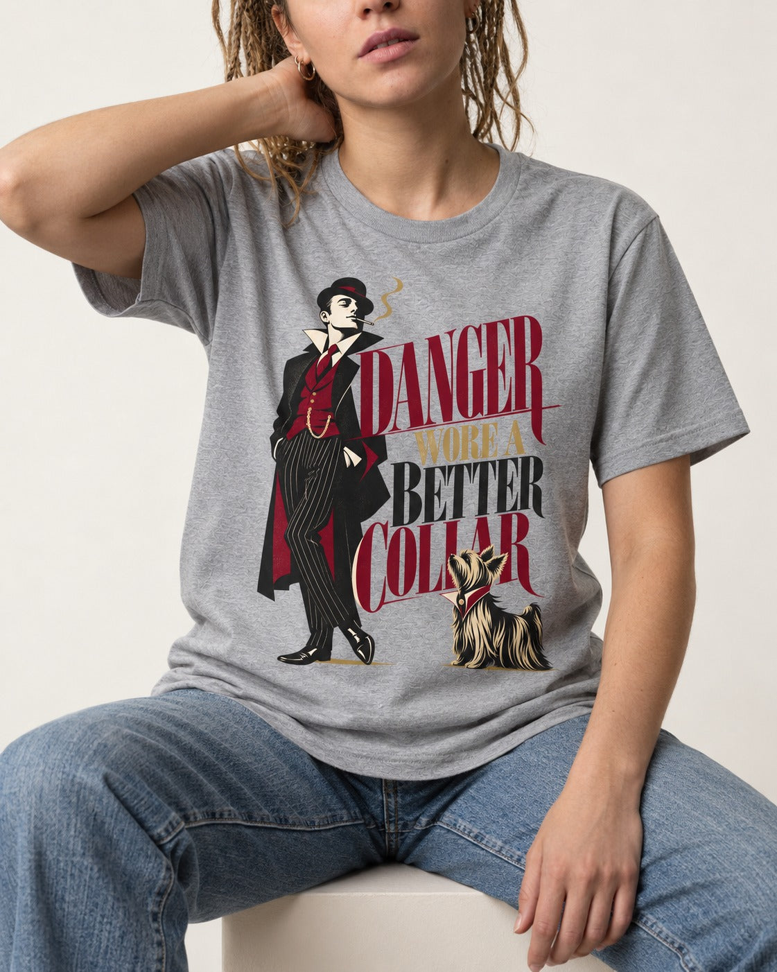 Yorkshire Terrier Danger Wore a Better Collar Art Deco Graphic T-Shirt in Sport Grey, worn by a seated model