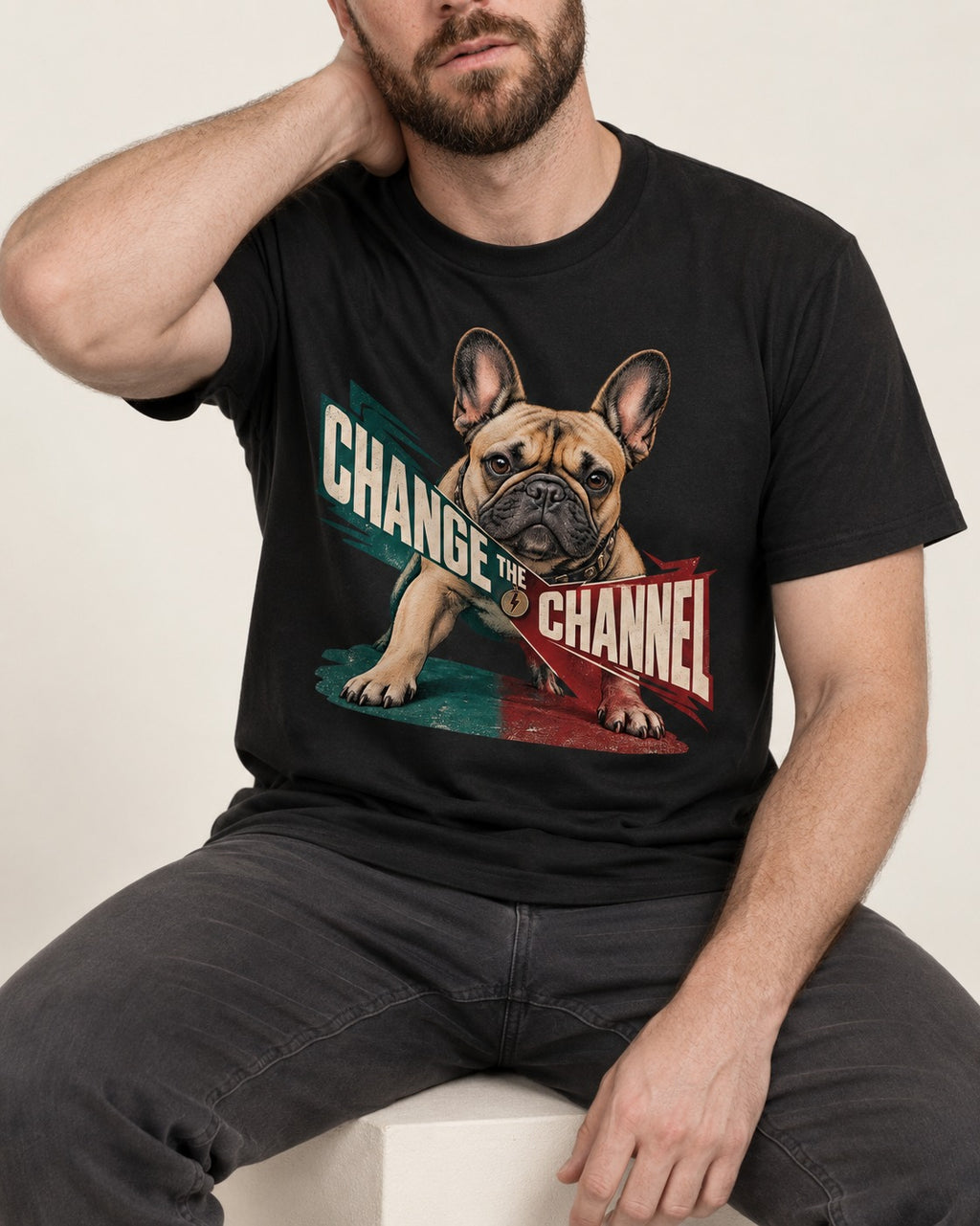 Frenchie Change the Channel Graphic T-Shirt in Black, worn by a seated model