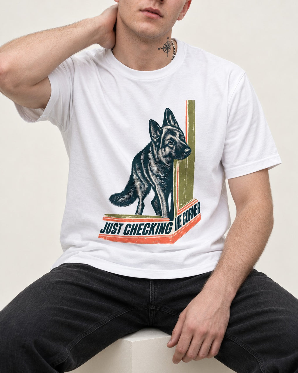German Shepherd Dog Just Checking the Corner T-Shirt in White, worn by a seated model