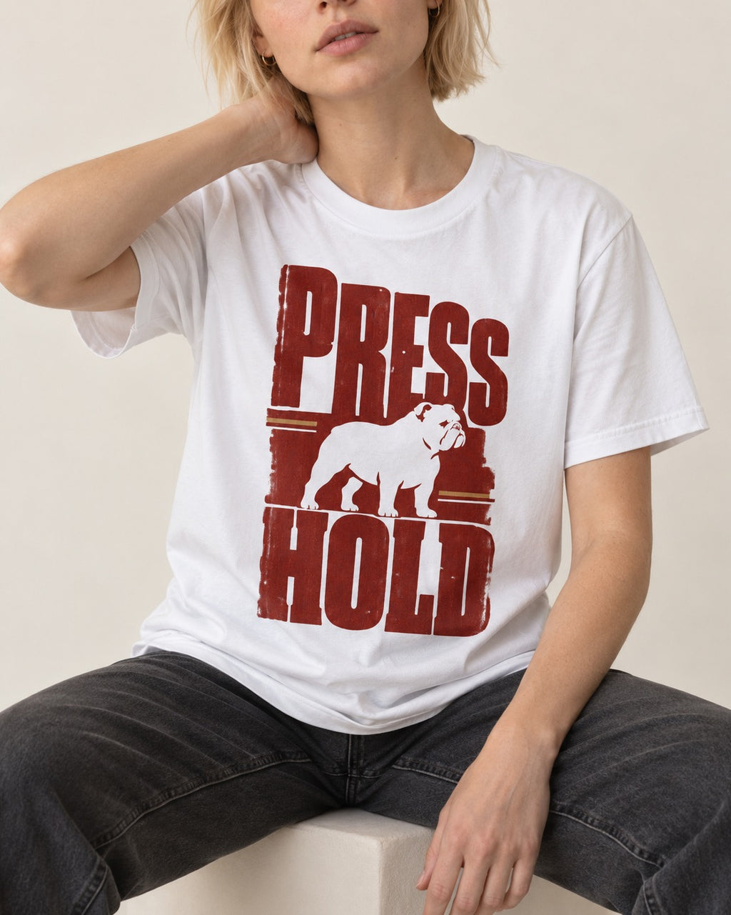 English Bulldog Press and Hold T-Shirt in White, worn by a seated model