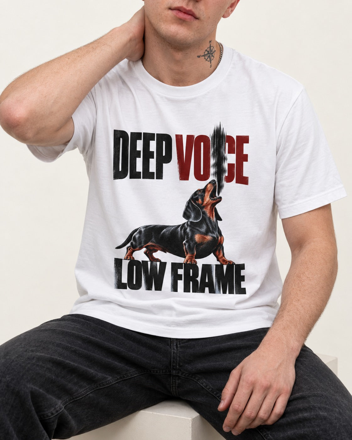 Deep Voice Low Frame Dachshund T-Shirt in White, worn by a seated model