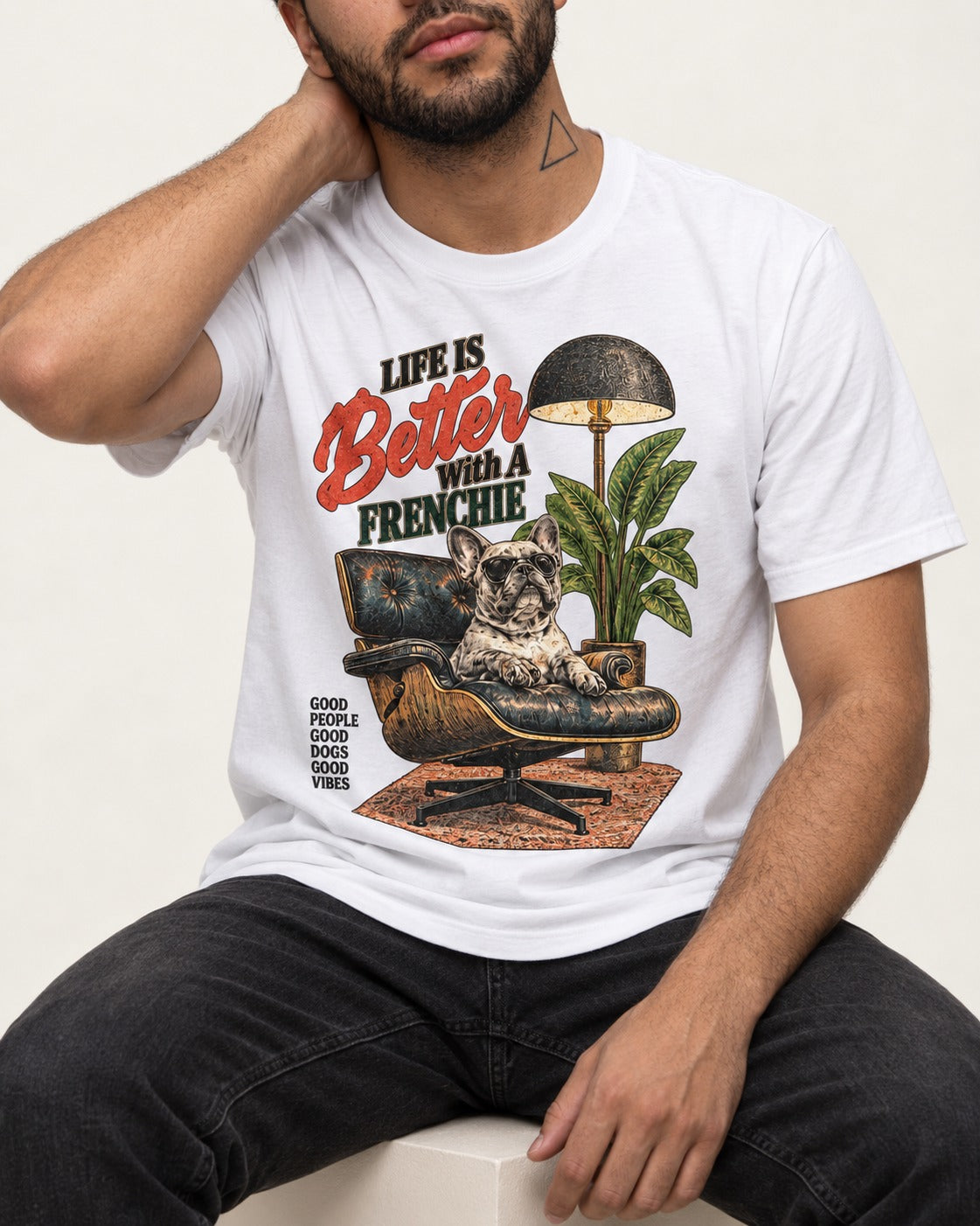 Better with a Frenchie T-Shirt in White, worn by a seated model