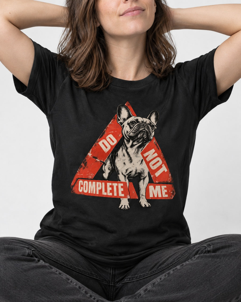 Frenchie Do Not Complete Me Warning Triangle Graphic T-Shirt in Black, worn by a seated model
