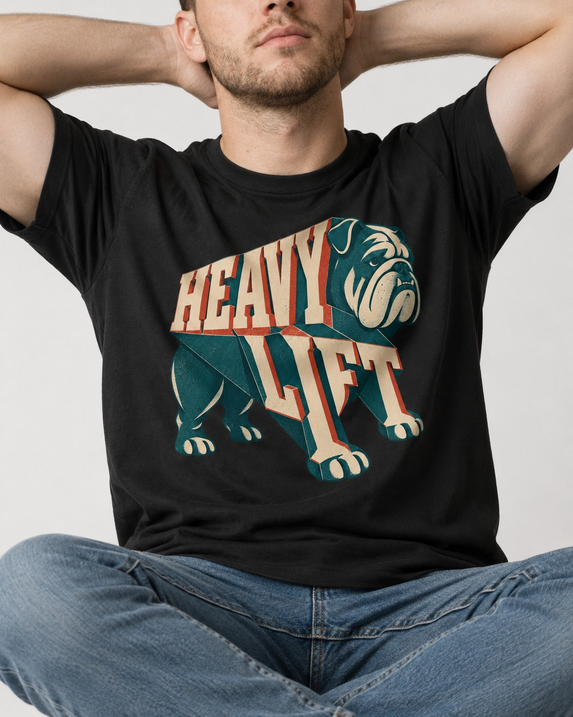 English Bulldog Heavy Lift Dimensional Type T-Shirt in Black, worn by a seated model