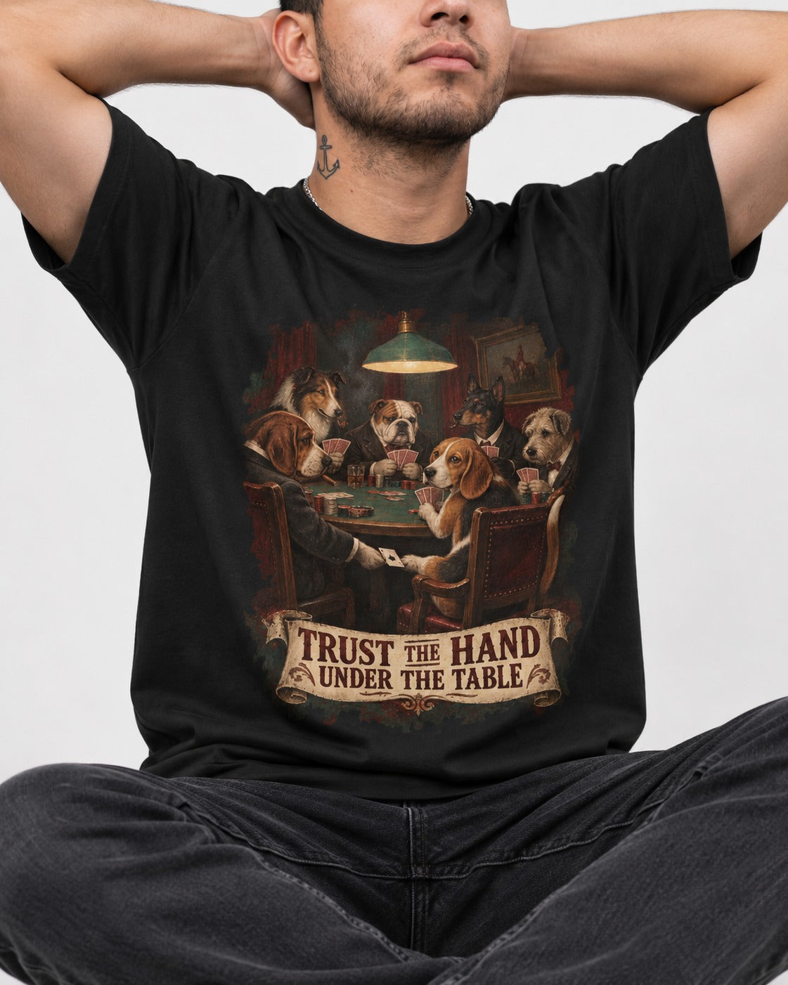 Trust The Hand Under The Table Beagle Poker Night T-Shirt in Black, worn by a seated model