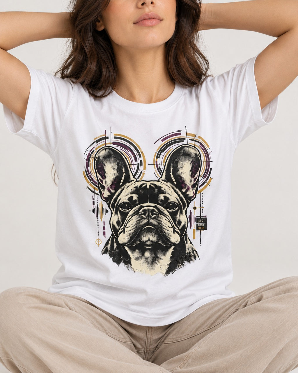 Frenchie Frequency T-Shirt in White, worn by a seated model
