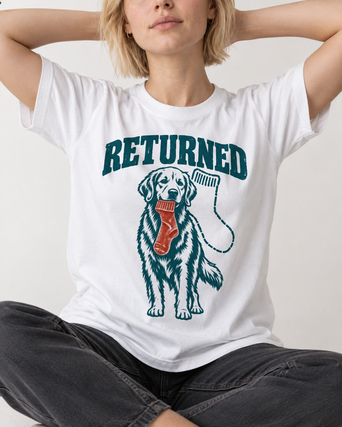 Golden Retriever Returned T-Shirt in White, worn by a seated model