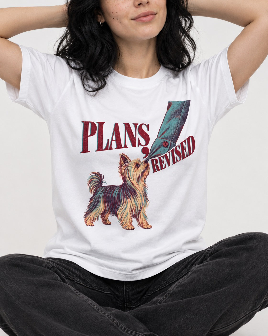 Yorkshire Terrier Plans Revised T-Shirt in White, worn by a seated model