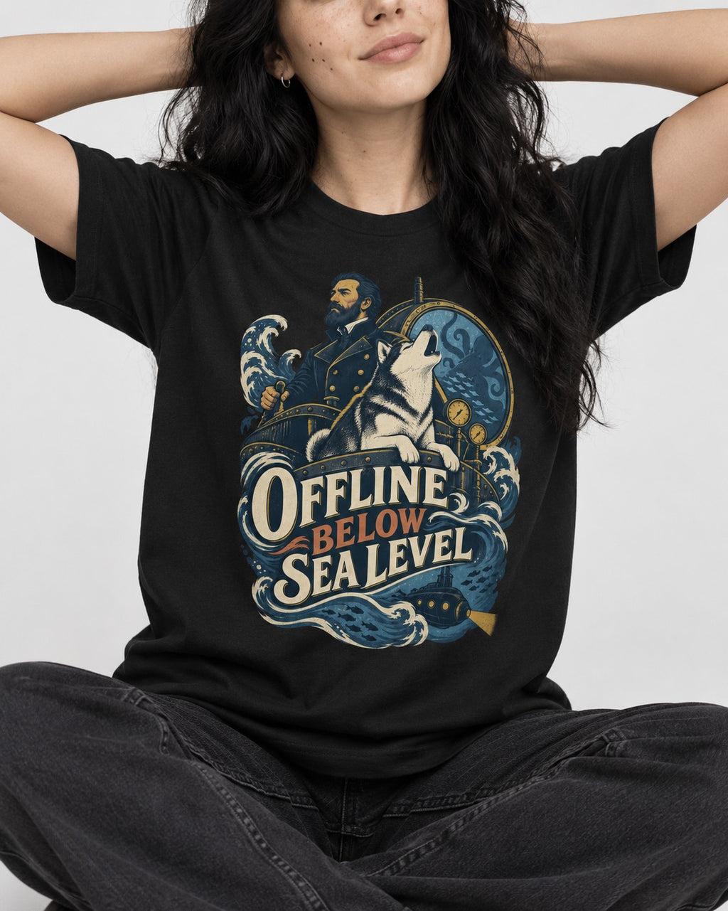 Husky Offline Below Sea Level Nautical Submarine Graphic T-Shirt in Black, worn by a seated model