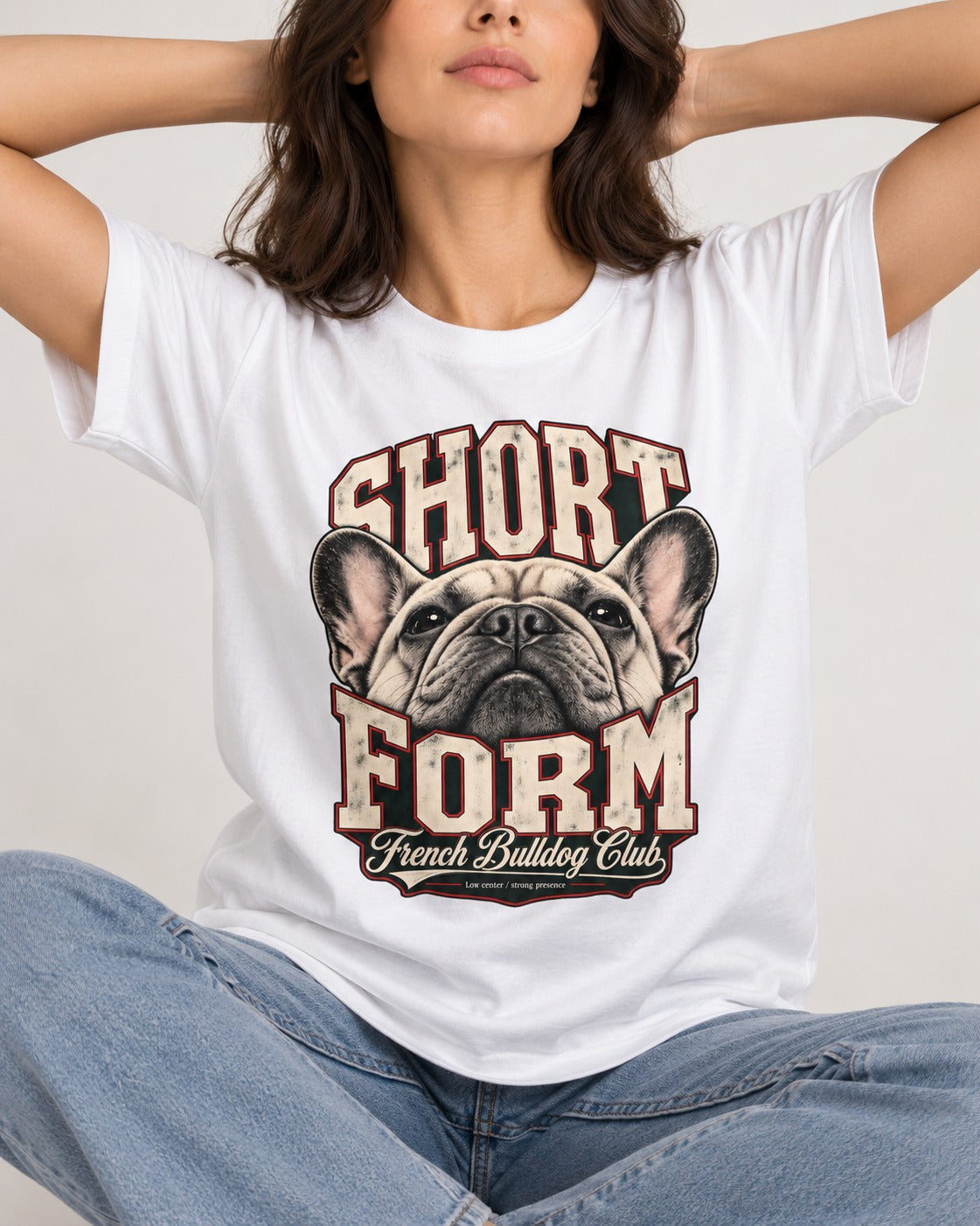 Short Form Frenchie T-Shirt in White, worn by a seated model
