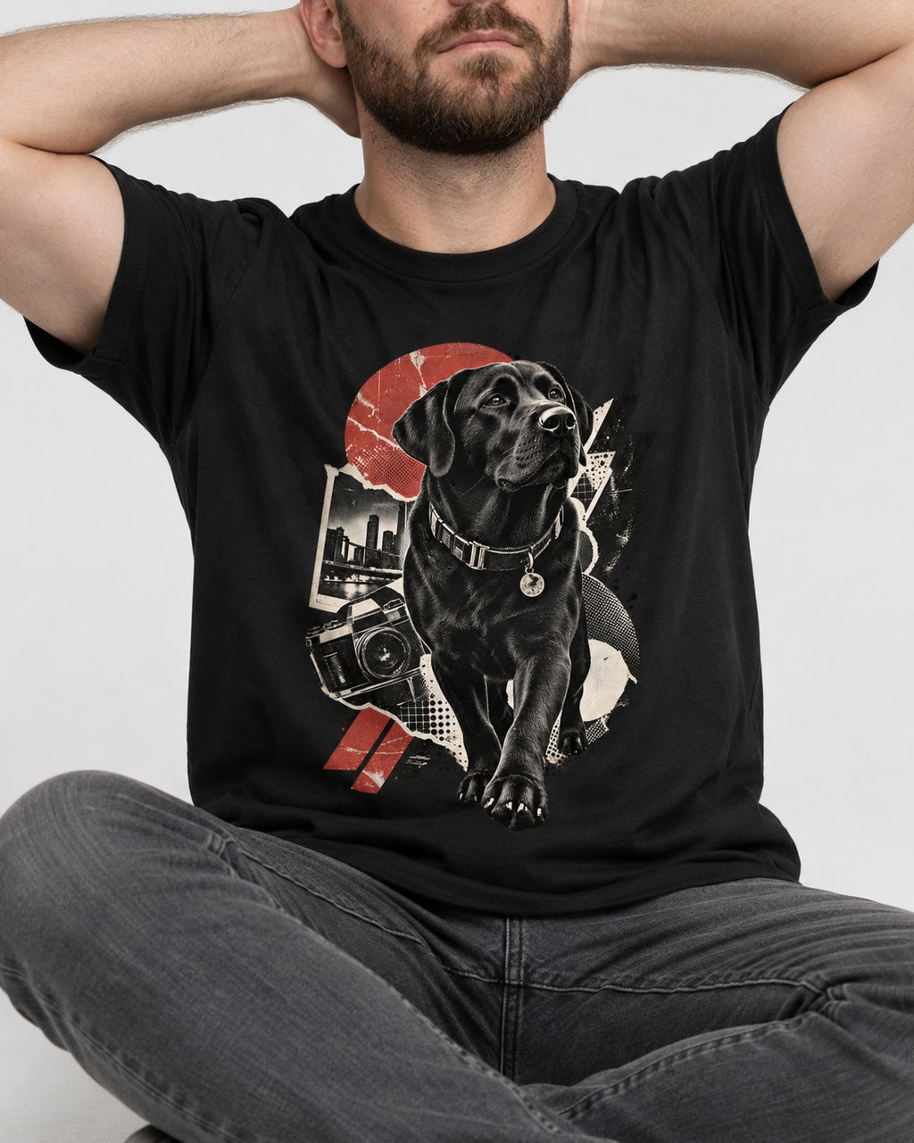 Labrador Retriever Camera City Halftone Collage Graphic T-Shirt in Black, worn by a seated model