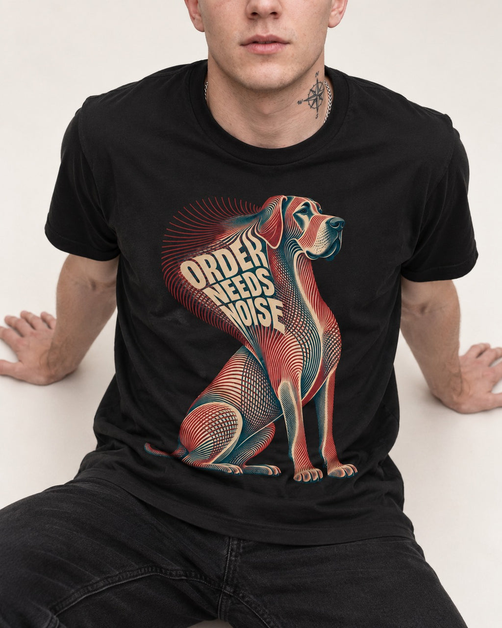 Great Dane Order Needs Noise Optical Line Graphic T-Shirt in Black, worn by a seated model