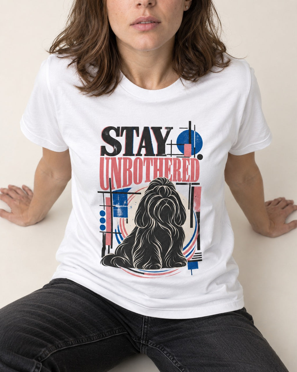 Stay Unbothered Shih Tzu T-Shirt in White, worn by a seated model