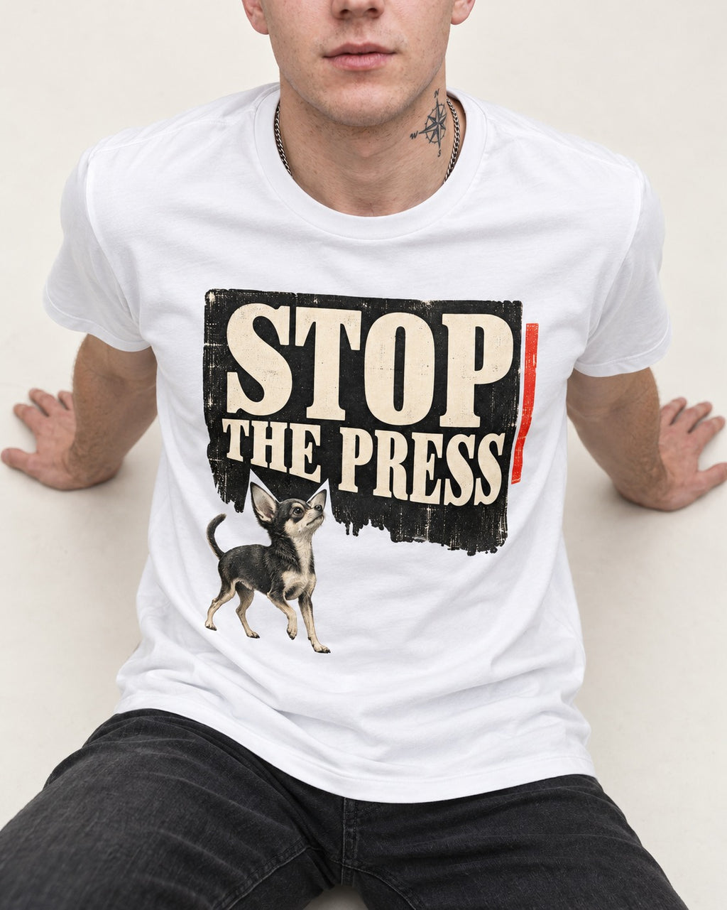 Stop the Press Chihuahua T-Shirt in White, worn by a seated model