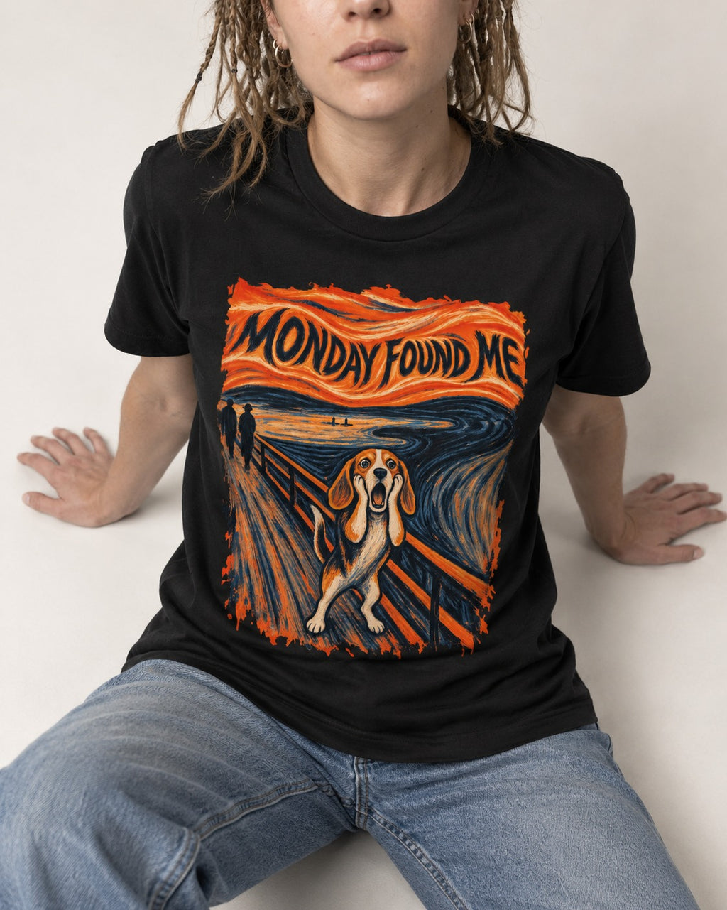 Monday Found Me Beagle Scream Scene T-Shirt in Black, worn by a seated model