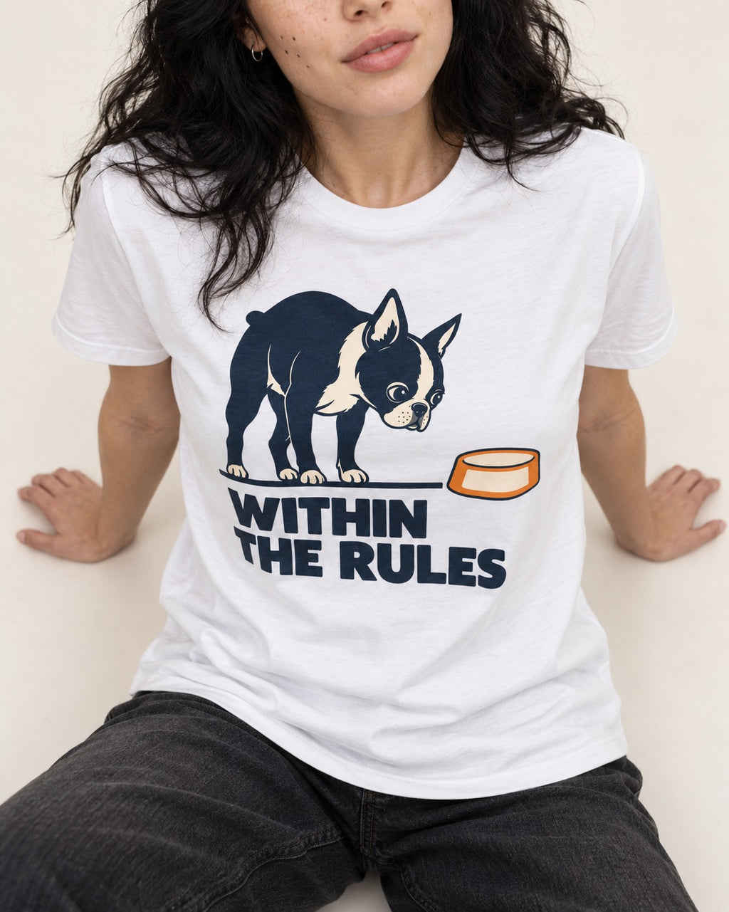 Within the Rules Boston Terrier T-Shirt in White, worn by a seated model