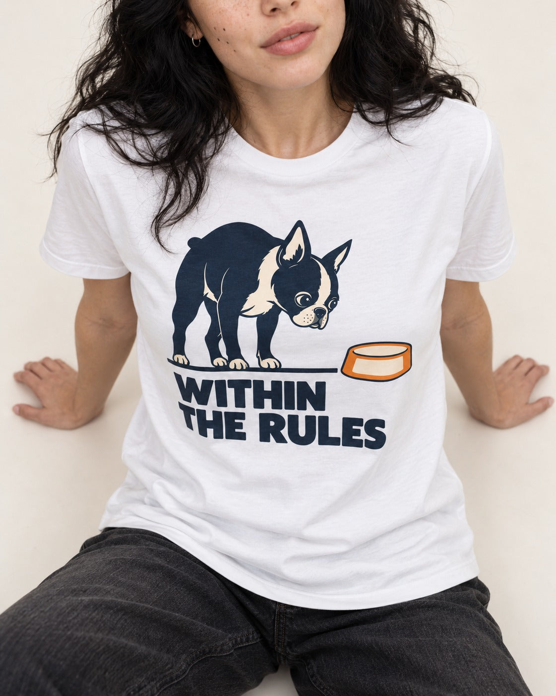 Within the Rules Boston Terrier T-Shirt in White, worn by a seated model