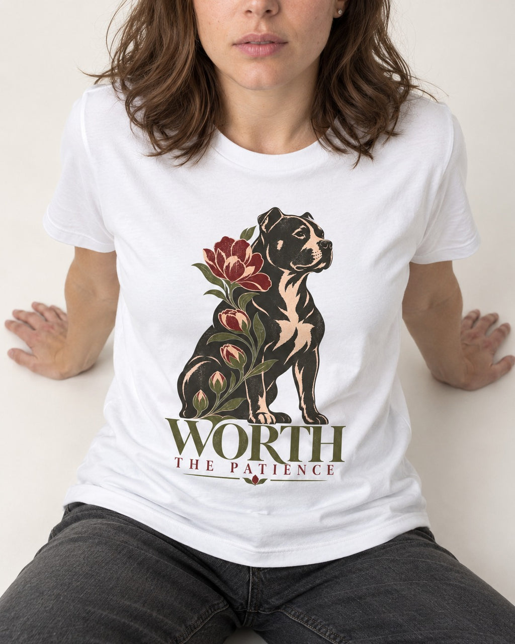 Pitbull Worth the Patience T-Shirt in White, worn by a seated model