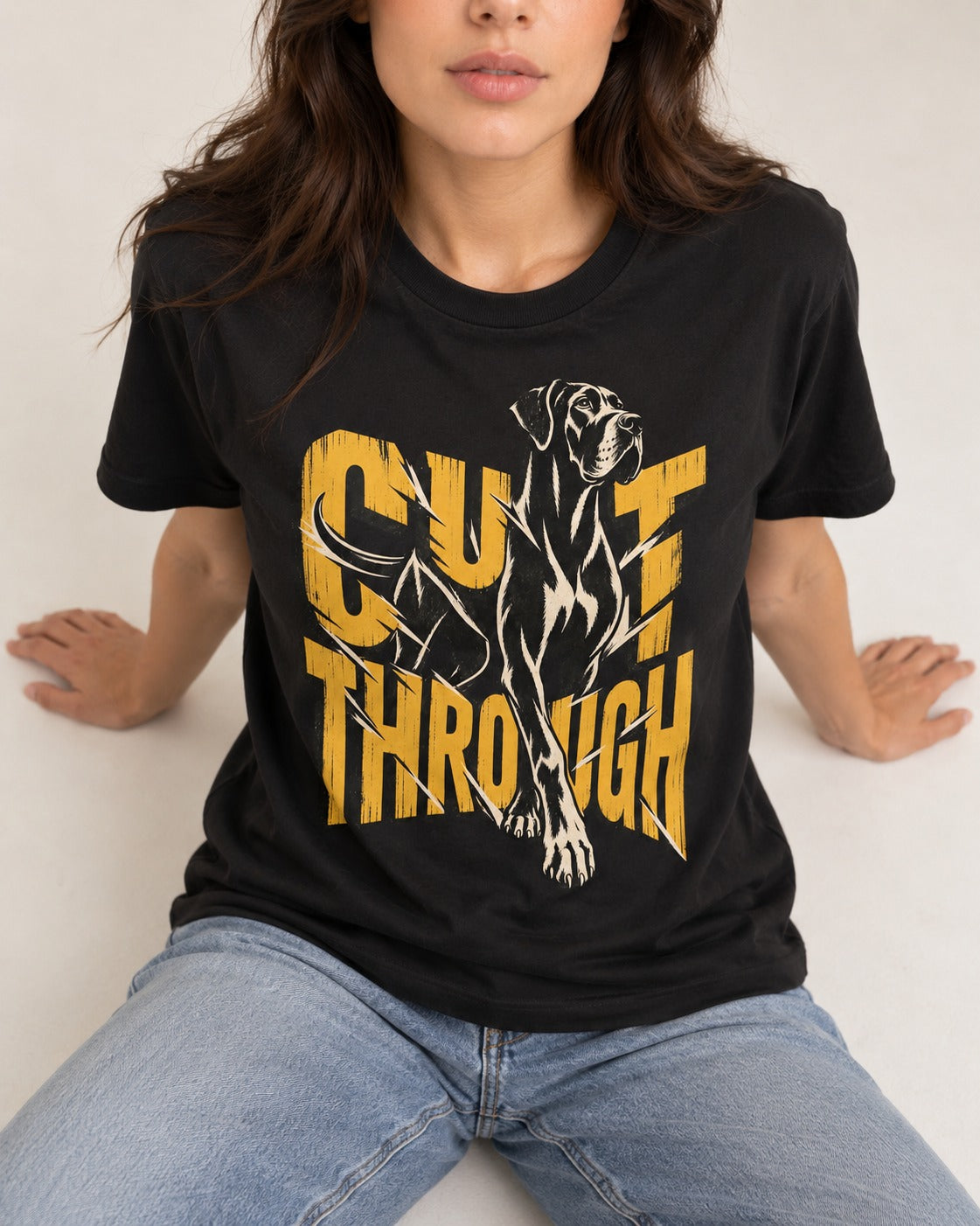 Great Dane Cut Through Breaking Type Graphic T-Shirt in Black, worn by a seated model