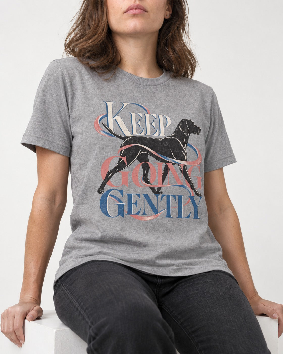 German Shorthaired Pointer Keep Going Gently Walking Graphic T-Shirt in Sport Grey, worn by a seated model