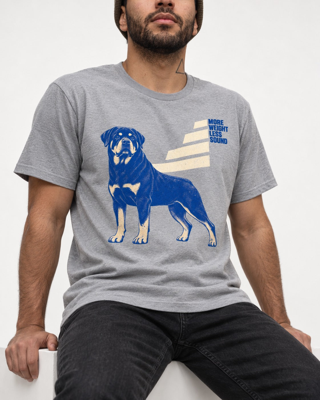 Rottweiler More Weight Less Sound Stair Step Graphic T-Shirt in Sport Grey, worn by a seated model