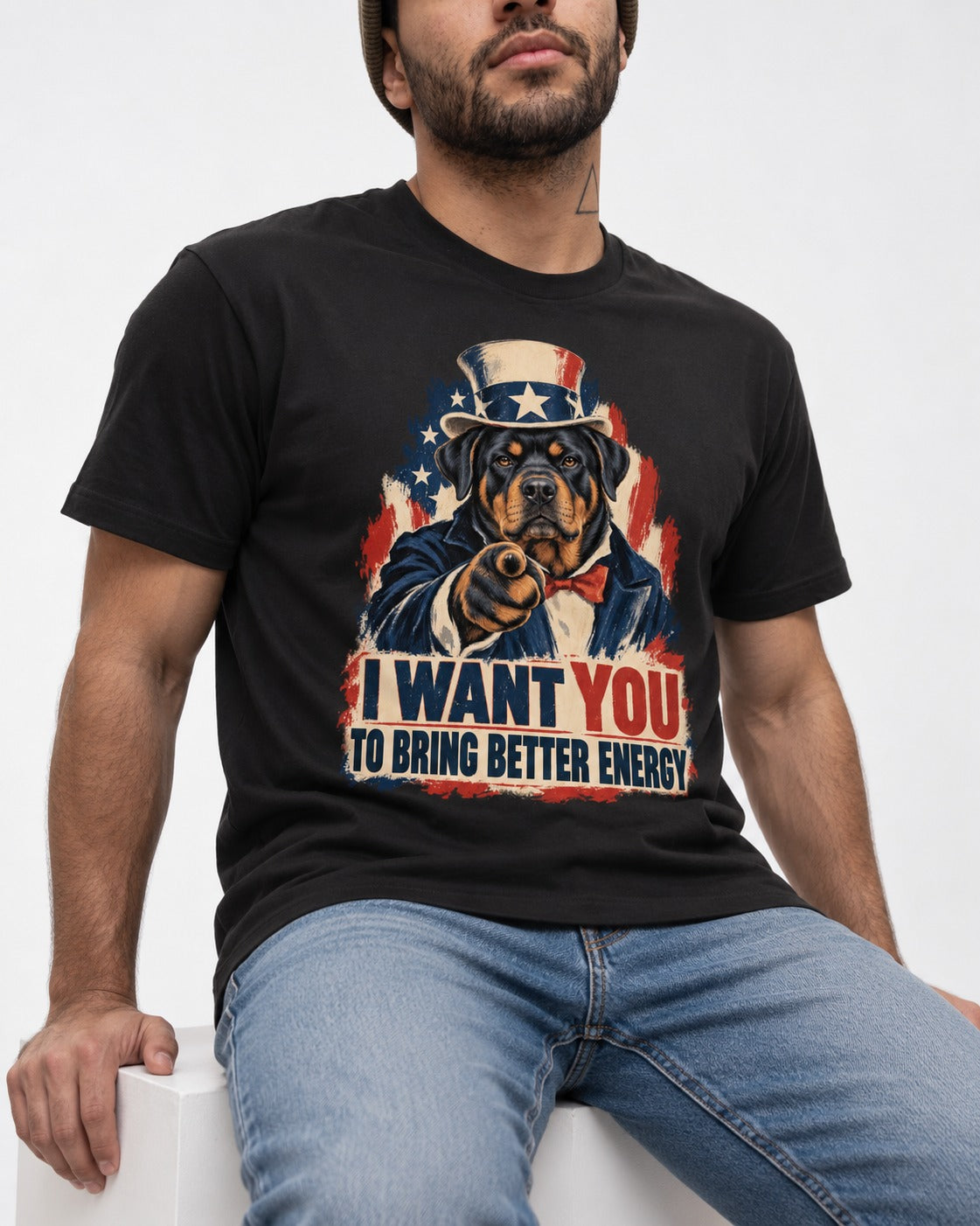 Rottweiler I Want You to Bring Better Energy Recruitment Poster Graphic T-Shirt in Black, worn by a seated model