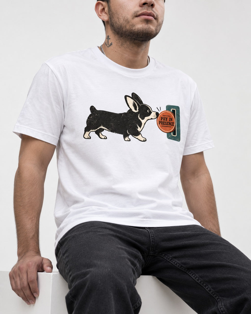 Corgi Pay in Presence T-Shirt in White, worn by a seated model