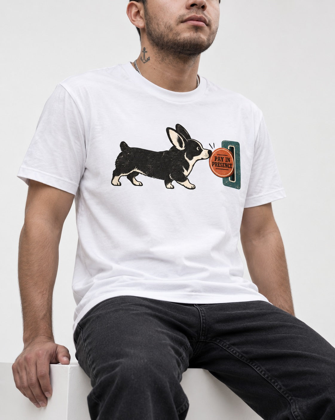 Corgi Pay in Presence T-Shirt in White, worn by a seated model