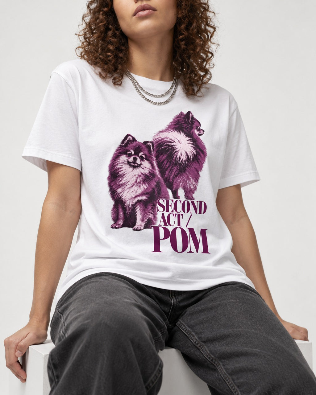 Second Act Pomeranian T-Shirt in White, worn by a seated model