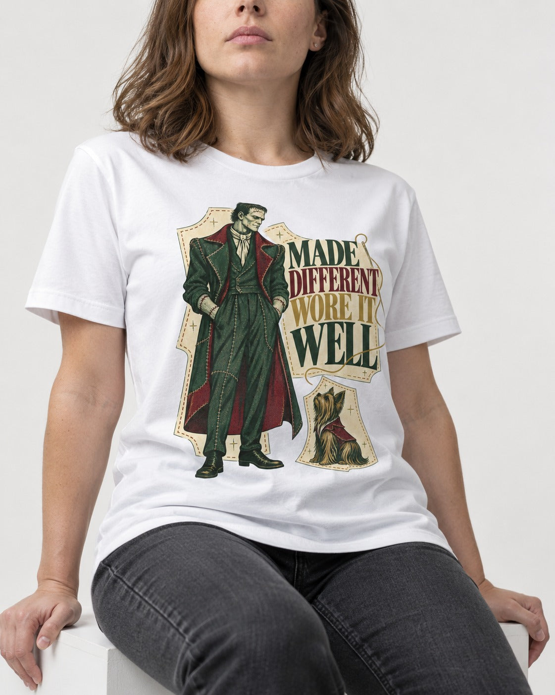 Yorkshire Terrier Made Different T-Shirt in White, worn by a seated model