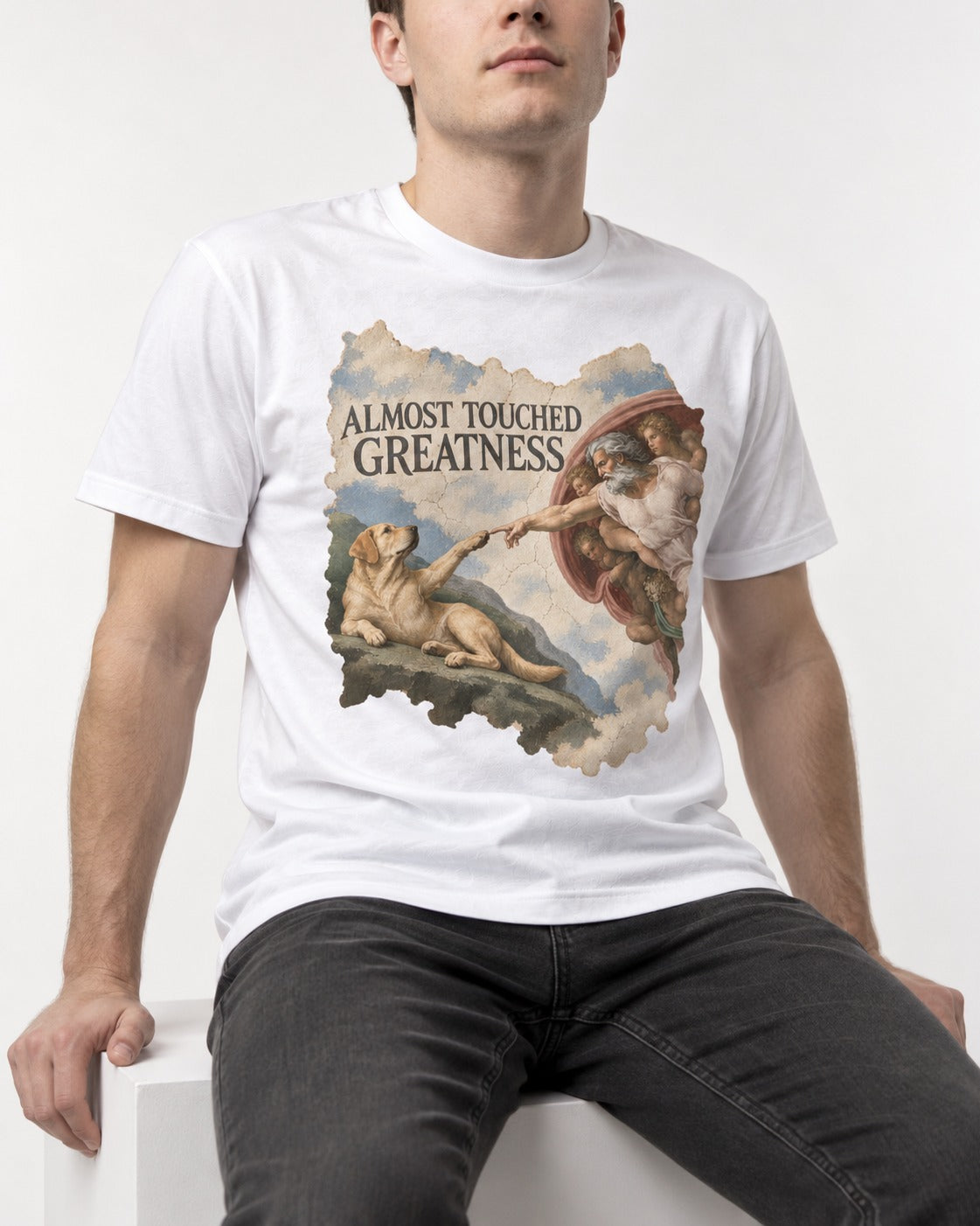 Labrador Retriever Almost Touched Greatness T-Shirt in White, worn by a seated model