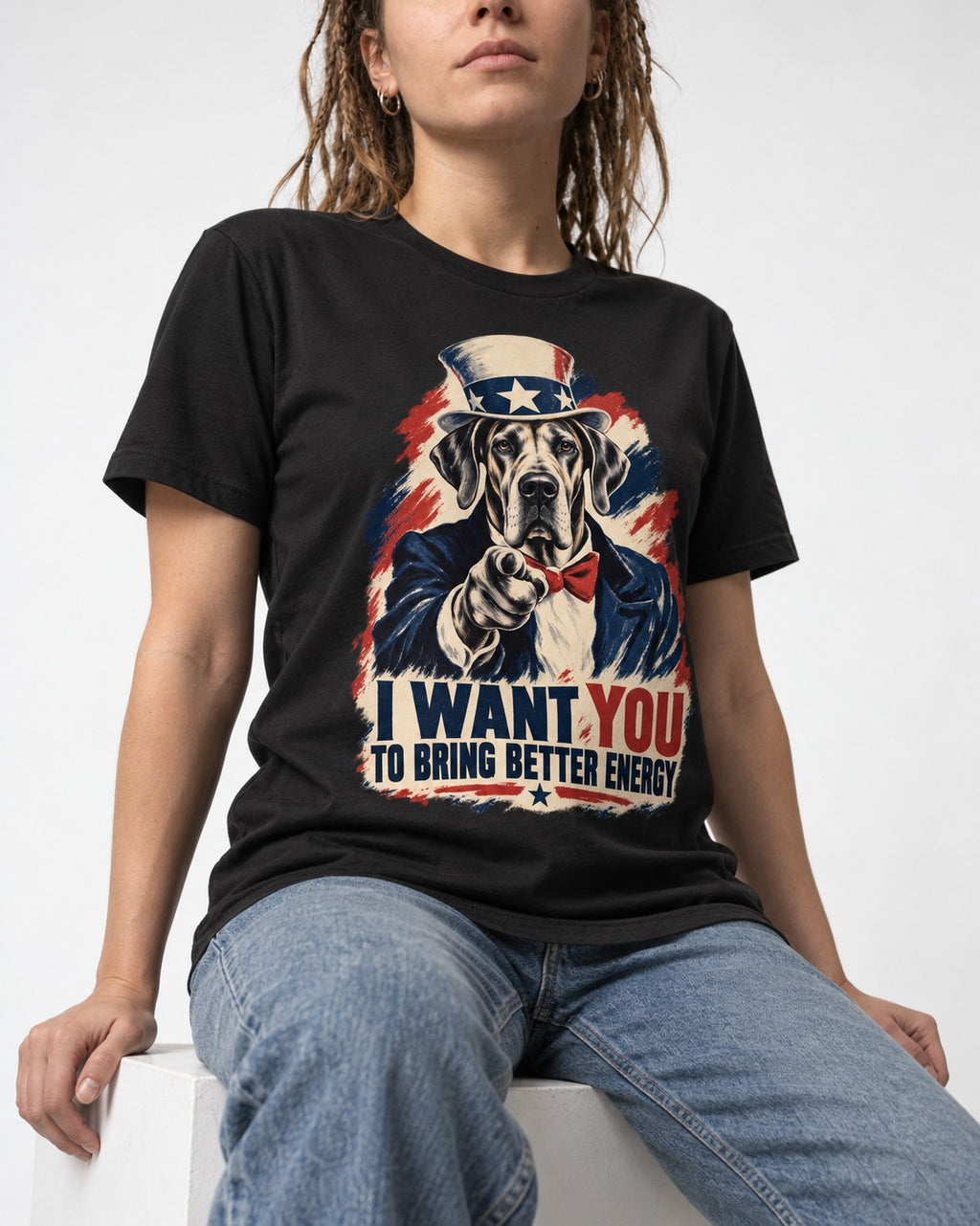Great Dane I Want You to Bring Better Energy Uncle Sam Graphic T-Shirt in Black, worn by a seated model