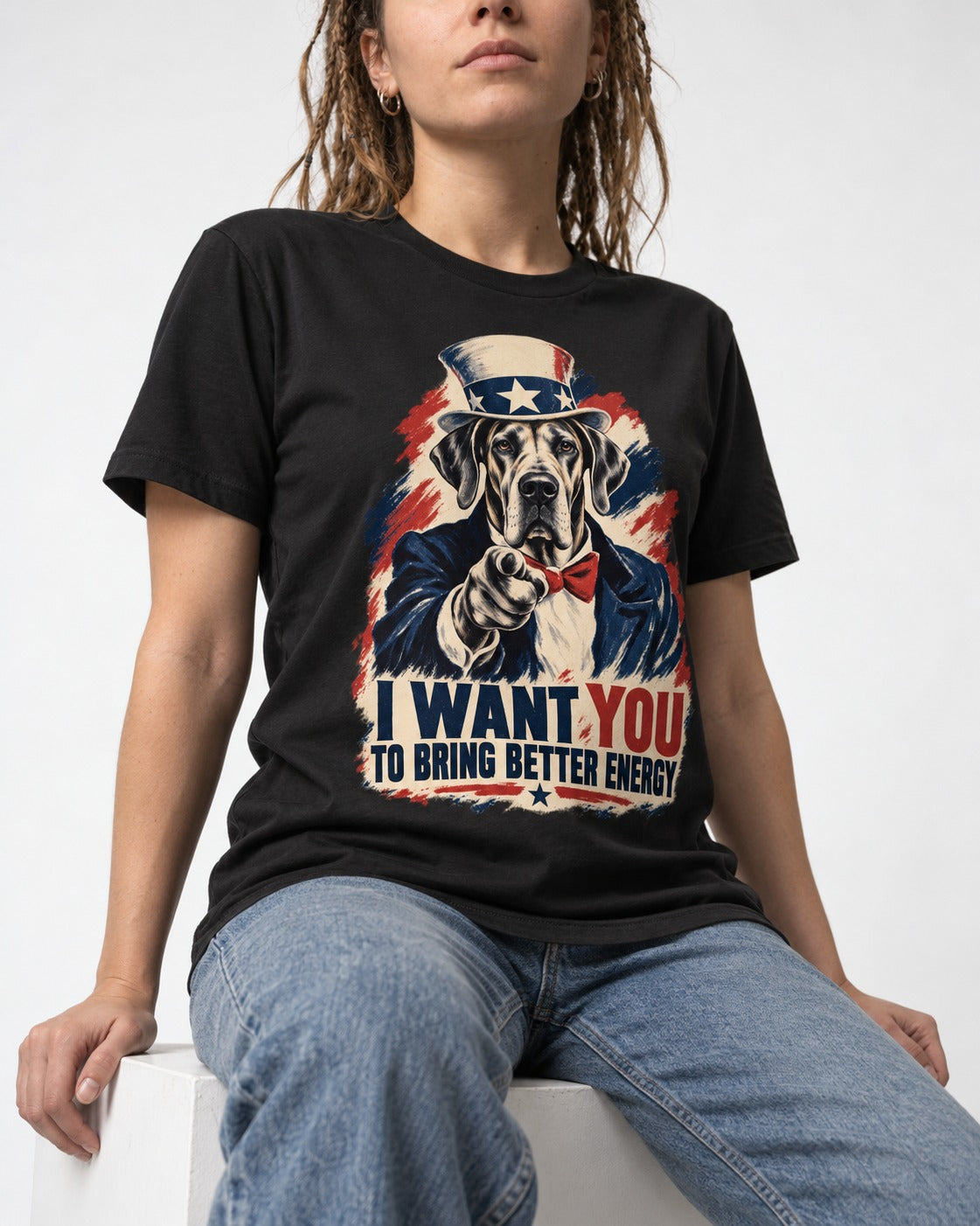 Great Dane I Want You to Bring Better Energy Uncle Sam Graphic T-Shirt in Black, worn by a seated model