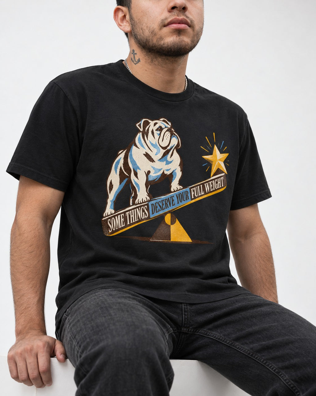 Some Things Deserve Your Full Weight English Bulldog Graphic T-Shirt in Black, worn by a seated model